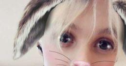 Young person with digital bunny ears and whiskers filter, showcasing playful creativity and digital expression.