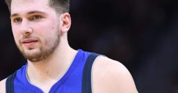 Luka Doncic in a Dallas Mavericks jersey, showcasing skill and determination on the basketball court.