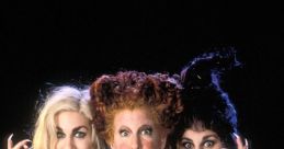 Three iconic witches from Hocus Pocus pose playfully, showcasing their unique costumes and mischievous expressions.