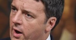 Matteo Renzi delivers a speech, showcasing his leadership and political influence in a formal setting.
