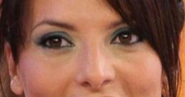 Close-up of Susanna Trevisan, showcasing her striking makeup and elegant necklace, exuding confidence and charm.