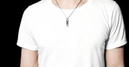 Аяз Гайнеев in a casual white t-shirt, showcasing his arm tattoo and stylish accessories, exuding confidence and charisma.