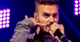 MattPahh performing on stage, showcasing his unique style and energetic presence with a microphone in hand.