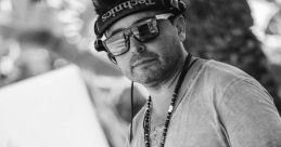 DJ Christian Jose Montoya performing at an outdoor event, showcasing his energetic style and passion for music.