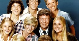 Classic TV family portrait of the Brady Bunch, showcasing the beloved characters in vibrant attire and cheerful expressions.