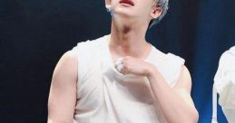 Wonho from Monsta X showcasing his charisma on stage, captivating the audience with an electrifying performance.