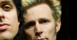 Green Day band members showcasing their unique style, featuring dramatic hairstyles and distinctive outfits in a studio setting.