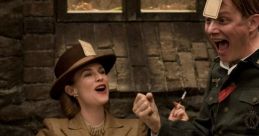Lively scene from "Inglourious Basterds" featuring characters in a game, showcasing humor and tension during a dinner setting.