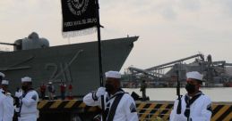 Naval ceremony at Marina in Mexico, showcasing sailors in uniform with a flag, emphasizing maritime tradition and honor.