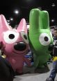 Colorful inflatable Hoops and Yoyo characters at a lively event, appealing to fans and collectors of animated fun.