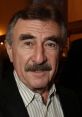 Leonid Kanevsky, prominent Russian actor known for "Следствие ведут знатоки," smiling at a public event.