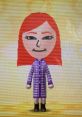 Mii character with red hair in a purple checkered outfit, styled for Tomodachi Life default voice (boy) gameplay.