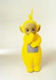 Laa Laa from Teletubbies, a cuddly yellow character, standing with a playful pose, ready for adventure and fun.