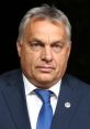 Viktor Orbán, Hungarian politician, wearing a suit and blue tie, presenting a serious expression at a public appearance.