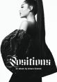 Ariana Grande poses in dramatic fashion, showcasing her album "Positions" with bold styling and striking visuals.