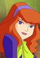 Daphne Blake from Scooby-Doo, voiced by Grey DeLisle, featuring her iconic stylish look with red hair and vibrant outfit.
