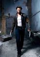 Hugh Jackman as Wolverine stands confidently with claws extended in a gritty, industrial setting, embodying the iconic Marvel character.