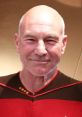 Smiling Patrick Stewart as Jean-Luc Picard, wearing his iconic Starfleet uniform from Star Trek: The Next Generation.