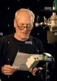 Paul Newman recording as Doc Hudson for the animated film "Cars," showcasing his iconic voice talent in a studio.
