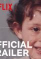 Child with curly hair smiling, featuring "OFFICIAL TRAILER" and "NETFLIX" text, evoking nostalgia and anticipation.