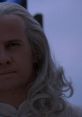 Christopher Lambert as Raiden in Mortal Kombat (1995), showcasing his iconic long white hair and intense expression.