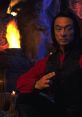 Cary Hiroyuki Tagawa as Shang Tsung in older years, posing with a mystical background, exuding dark power and mystery.