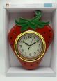 Colorful strawberry wall clock with green leaves, perfect for adding a fun touch to any room decor or children's space.