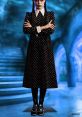 Wednesday Addams in a classic polka dot dress, showcasing her iconic look with a dark, mysterious backdrop.