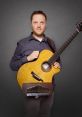 Trevor Gordon Hall Type your text to hear it in the voice of Trevor Gordon Hall. The soothing strumming of a guitar fills