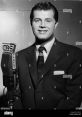 Fred Robbins Type your text to hear it in the voice of Fred Robbins. The hum of the servers filled the room, creating a