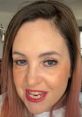 Close-up of Mel, the Isolation Queen from TikTok, showcasing her vibrant personality and signature red lipstick.