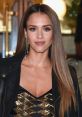 Jessica Alba showcases her chic style with sleek hair and a stylish outfit, exuding elegance at a glamorous event.