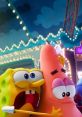 SpongeBob and Patrick share a fun moment at a colorful amusement park with festive lights in the background.