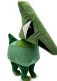 Plush Drilly from Garn47, featuring vibrant green colors and playful design, perfect for collectors and fans alike.