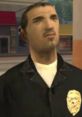 Jimmy Hernandez, a character in the game, wearing a black jacket with a police emblem, stands in an urban setting.