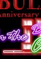 Neon sign celebrating Ted Thompson's anniversary with vibrant colors and dripping paint effects, showcasing a festive atmosphere.