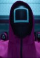 Squid Game guard in pink uniform with a square mask, representing the show's iconic characters and suspenseful themes.