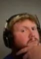 Thoughtful expression of a gamer wearing headphones, showcasing a casual gaming vibe with Casoh Loud spirit.
