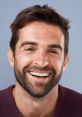 Smiling man with a friendly demeanor, showcasing an approachable and authentic voice in communication.