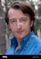 A Journalist Possessing Over a Decade of Expertise in the Craft of Concocting Digital Video Content Type your text to hear