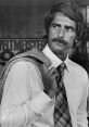 Resonant Voice of Maturity: Think Along the Lines of Sam Elliot, Mike Rowe, or Tom Bodette Type your text to hear it in