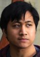 Focused expression of Kevin Paculan, capturing an intense moment of yelling, conveying strong emotions and energy.
