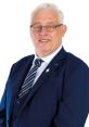 Professional portrait of Thomas Gould, showcasing his expertise in leadership and corporate governance.