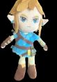 Plush toy featuring Link from a popular video game, showcasing his iconic blue outfit and serious expression.