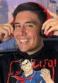 Smiling young man wearing headphones, showcasing enthusiasm for audio technology and AI Mixed Up Voice applications.