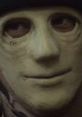 Close-up of The Man from Hush (2016), showcasing a haunting expression and distinctive mask, enhancing suspense and horror.