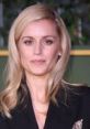 Denise Gough as Yennefer of Vengerberg, showcasing her captivating presence in a stylish black outfit.