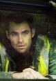 Will Colson (Chris Pine) in work attire, reflecting on challenges, showcasing determination amidst adversity.
