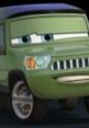 Sir Miles Axlerod, a green vehicle character from Cars, showcases a confident expression and sleek design.