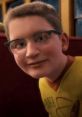 Know It All Boy from The Polar Express wearing glasses and a yellow shirt, showing curiosity on the train.